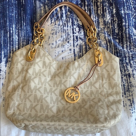 Michael Kors Handbags - Vanilla colored Michael Kors bag w/gold hardware